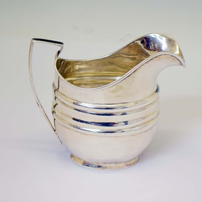 Lot 204 - George III silver cream jug