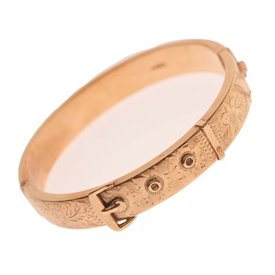Lot 107 - 9ct gold snap bangle of belt buckle design