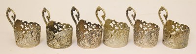 Lot 217 - Set of six 20th century German 800 standard white metal tea cup holders