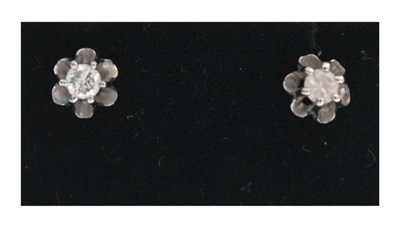 Lot 75 - Pair of 9ct white gold diamond single stone ear studs