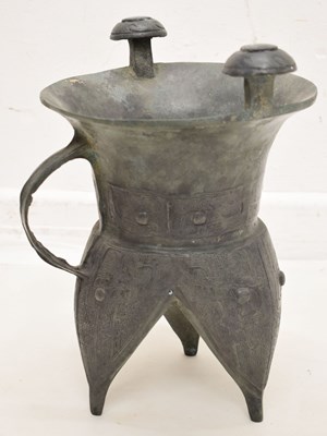 Lot 458 - 20th century bronze jia with traditional decoration and standing on three splayed feet