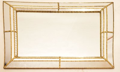Lot 553 - 20th century cushion wall mirror