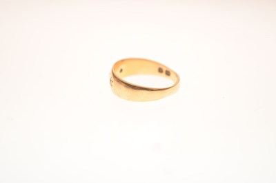 Lot 11 - Gypsy set three stone diamond yellow metal ring