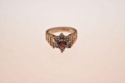 Lot 5 - 9ct gold garnet and diamond cluster ring