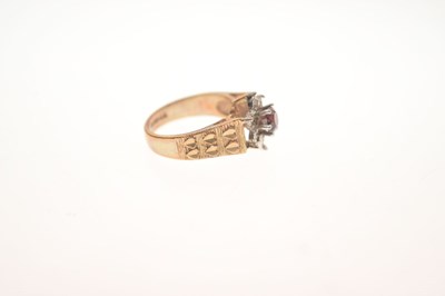 Lot 5 - 9ct gold garnet and diamond cluster ring