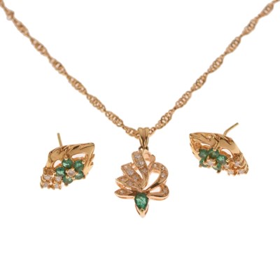 Lot 77 - Diamond and emerald yellow metal pendant and chain, together with earrings