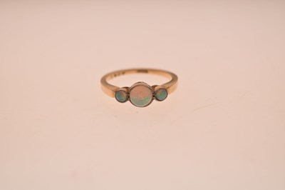 Lot 18 - Yellow metal opal three stone ring