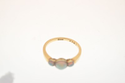 Lot 18 - Yellow metal opal three stone ring