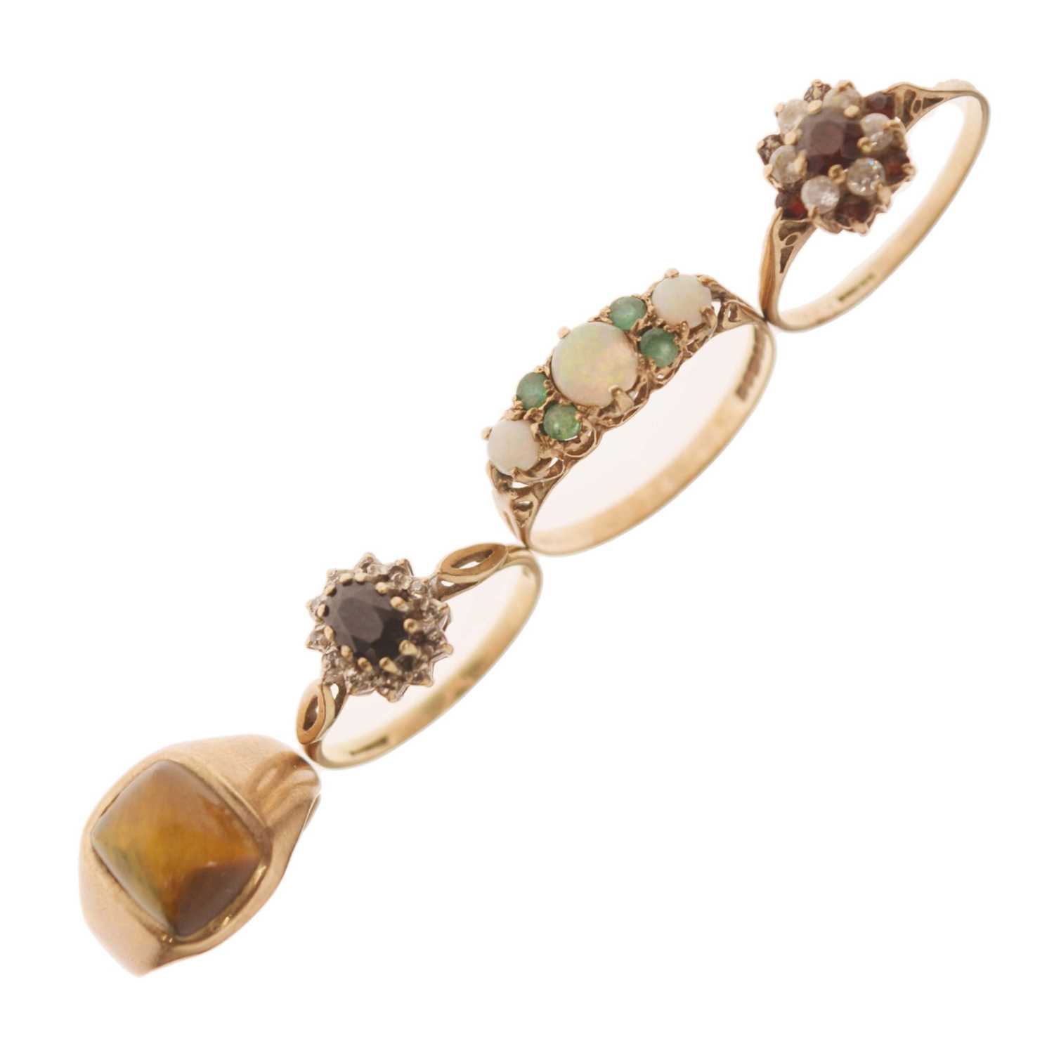 Lot 26 - Four 9ct gold gem set rings