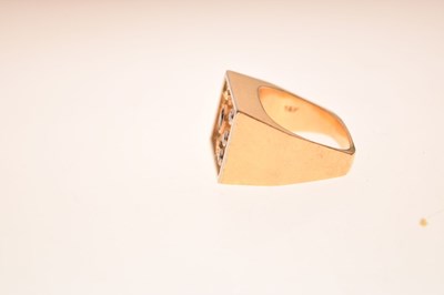 Lot 7 - Diamond and ruby yellow metal dress ring