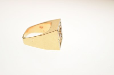 Lot 7 - Diamond and ruby yellow metal dress ring