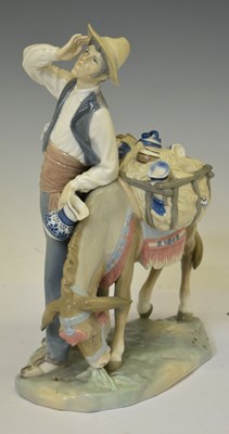 Lot 437 - Lladro porcelain figurine, 4859 'Typical Peddler'