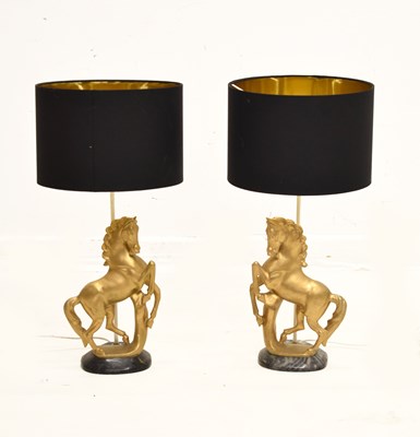 Lot 310 - Pair of gilded plaster horse table lamps