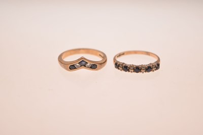 Lot 21 - Two 9ct gold sapphire and diamond / white stone rings