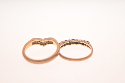 Lot 21 - Two 9ct gold sapphire and diamond / white stone rings
