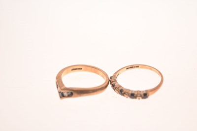 Lot 21 - Two 9ct gold sapphire and diamond / white stone rings