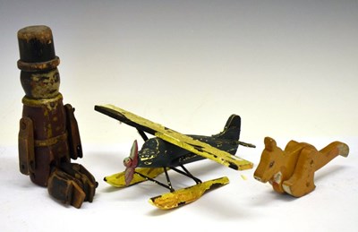 Lot 419 - Articulated wooden toy figure, together Kangaroo and seaplane