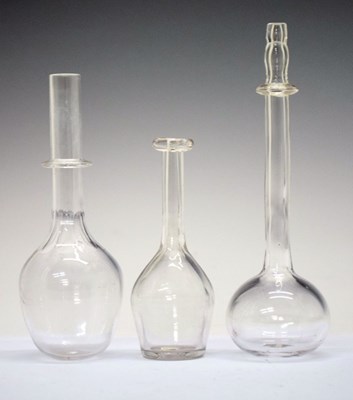 Lot 436 - Three various clear glass toddy lifters
