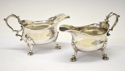 Lot 163 - Pair of George II silver sauce boats