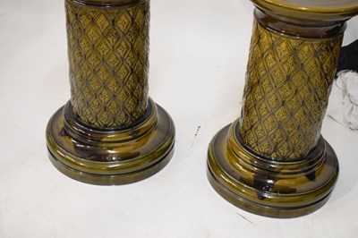 Lot 405 - Pair of Burmantofts dragon double gourd vases on pedestal bases