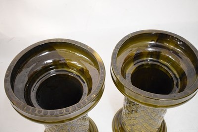 Lot 405 - Pair of Burmantofts dragon double gourd vases on pedestal bases