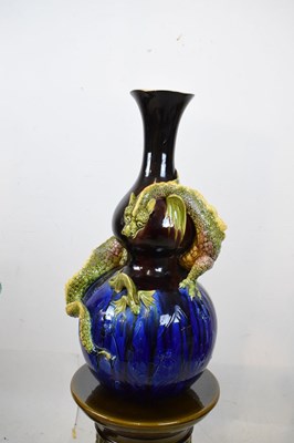Lot 405 - Pair of Burmantofts dragon double gourd vases on pedestal bases