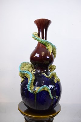 Lot 405 - Pair of Burmantofts dragon double gourd vases on pedestal bases
