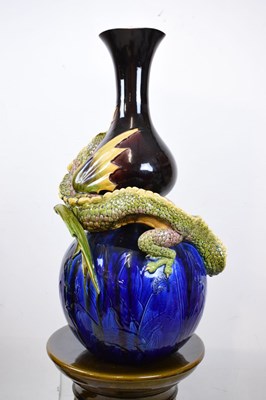 Lot 405 - Pair of Burmantofts dragon double gourd vases on pedestal bases
