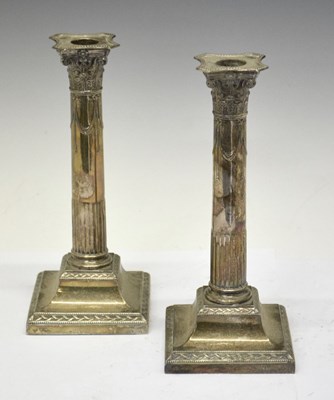 Lot 198 - Pair of George V silver column candlesticks