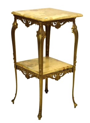 Lot 697 - Onyx and brass table