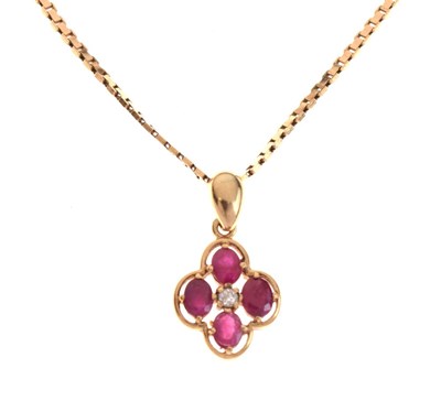 Lot 55 - 9ct gold, ruby and diamond quatrefoil pendant on a 9ct chain