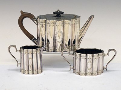 Lot 183 - Victorian silver bachelor's three-piece tea set of oval ribbed form