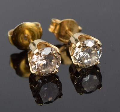 Lot 124 - Pair of single stone diamond ear studs