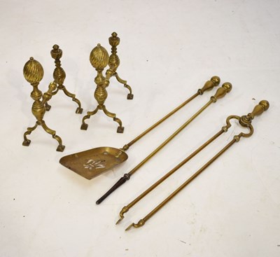 Lot 634 - Brass andirons and companion set
