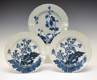 Lot 392 - Three English Delftware plates, c. 1750, possibly Liverpool