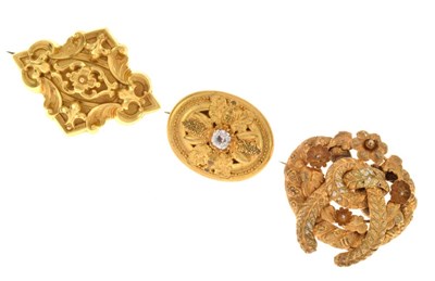 Lot 46 - Victorian yellow metal brooch, and two gilt metal brooches