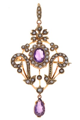 Lot 42 - Edwardian yellow metal, amethyst and seed pearl pendant brooch