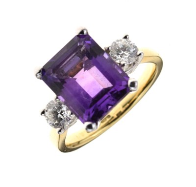 Lot 36 - Three stone amethyst and diamond 18ct gold ring
