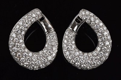 Lot 120 - Pair of pave set diamond hoop earrings
