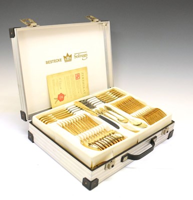 Lot 738 - German SBS- Bestecke - Cased canteen of twelve gilt handled cutlery