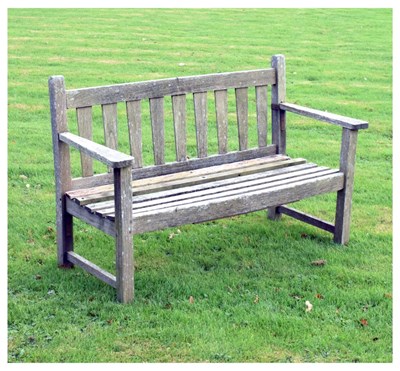 Lot 753 - Teak two seater garden bench of slatted design