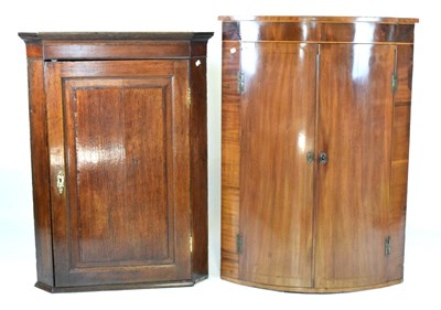 Lot 665 - Two Georgian corner cupboards