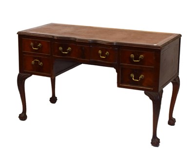Lot 605 - Mahogany writing table (one leg detached)
