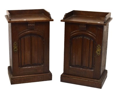Lot 606 - Pair of oak linenfold beside cupboards