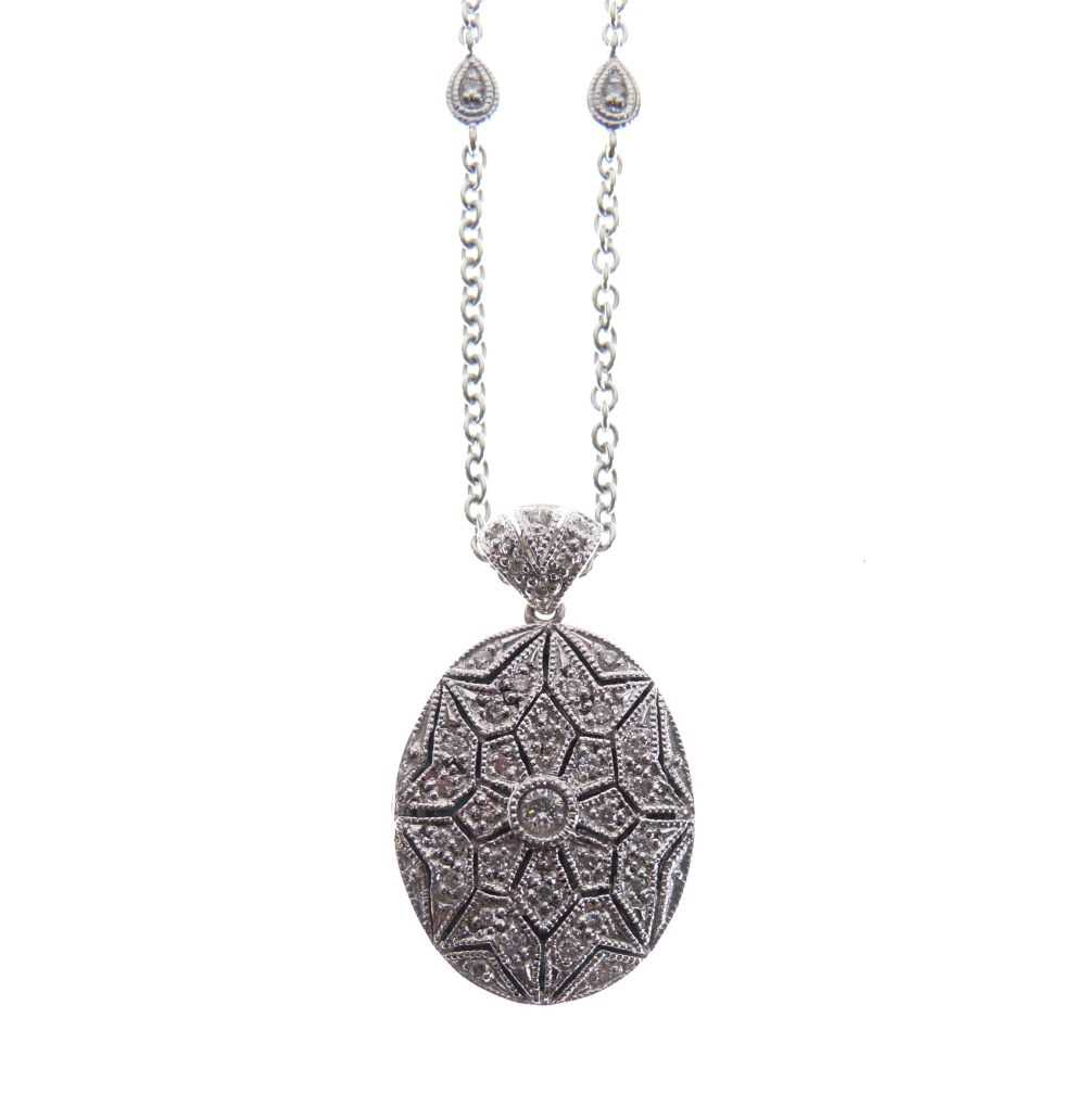 Lot 40 - 18ct white gold oval locket