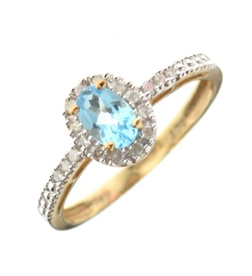 Lot 6 - 9ct gold blue topaz and diamond ring
