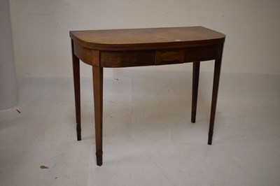 Lot 548 - George III mahogany D-shaped card table