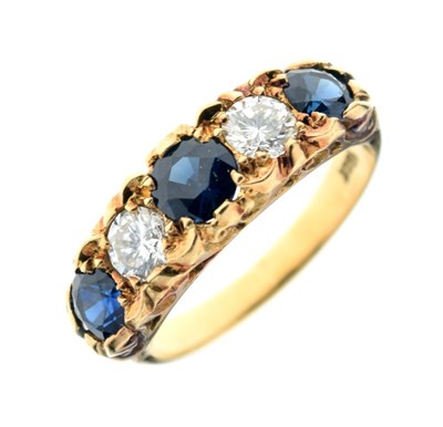 Lot 18 - Yellow metal, sapphire and diamond five stone ring