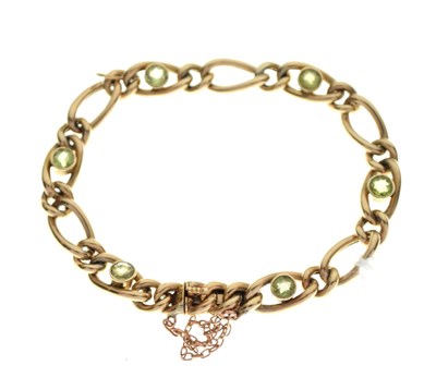 Lot 39 - Yellow metal peridot set bracelet