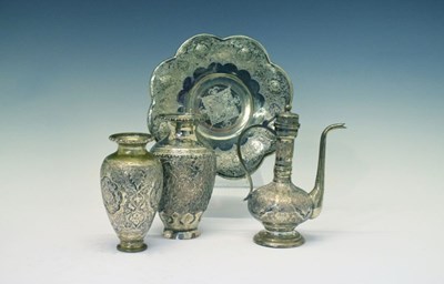 Lot 124 - Persian (possibly Isfahan) white metal ewer, together with a stand and two vases
